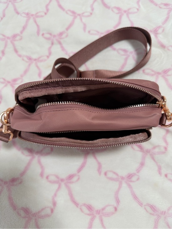 best hanging toiletry bag for travel Monos Metro Case Cosmetic & Bags Oxford Blue both water and scratch JanSport Weekender Square Sling bestseller25-crossbody Color:Oxford Tan-New British Tan